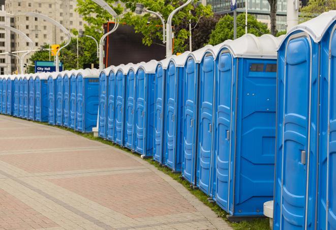 portable restrooms lined up at a marathon, ensuring runners can take a much-needed bathroom break in Edison